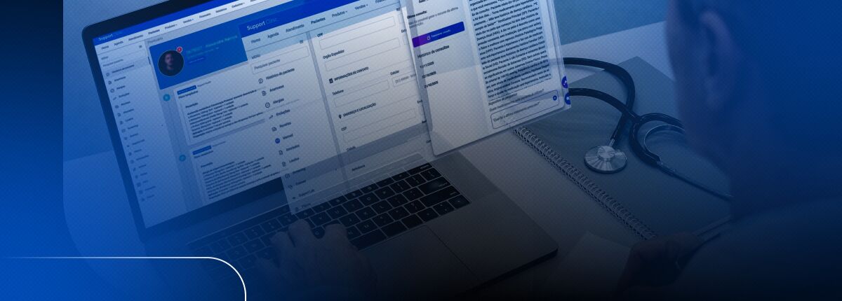 Pessoa analisando dados em computador com estetoscópio